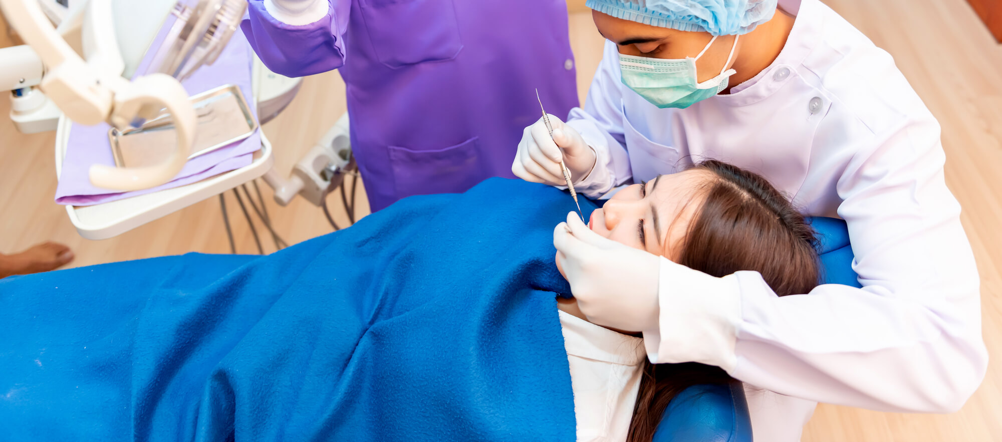 dentist placing Dental Implants in Miami